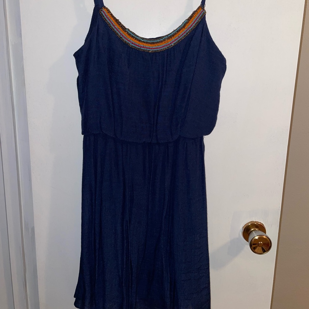 navy blue strapless dress with beaded detail
